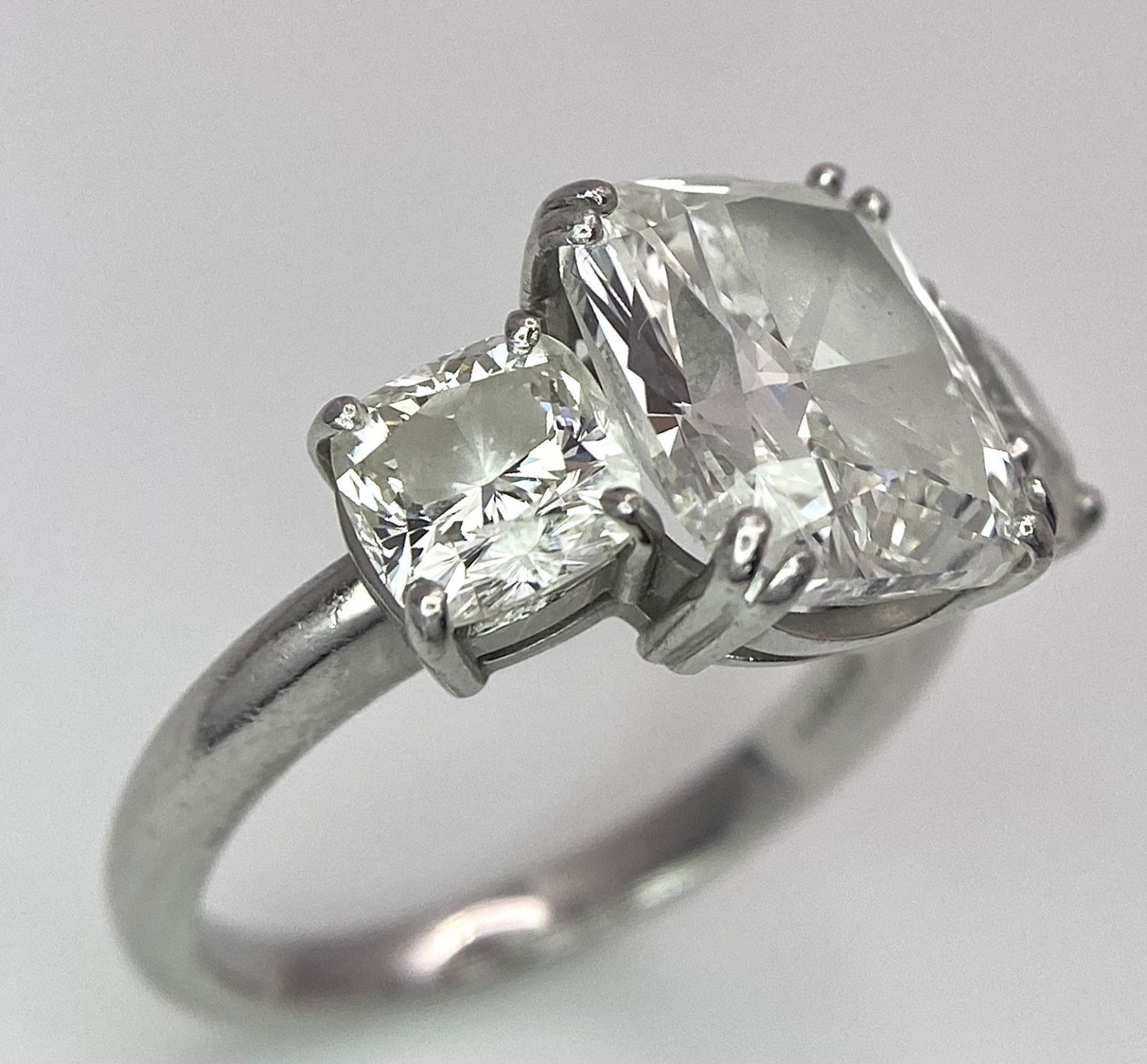 A Breathtaking 4.01ct GIA Certified Diamond Ring. A brilliant cushion cut 4.01ct central diamond - Image 6 of 21