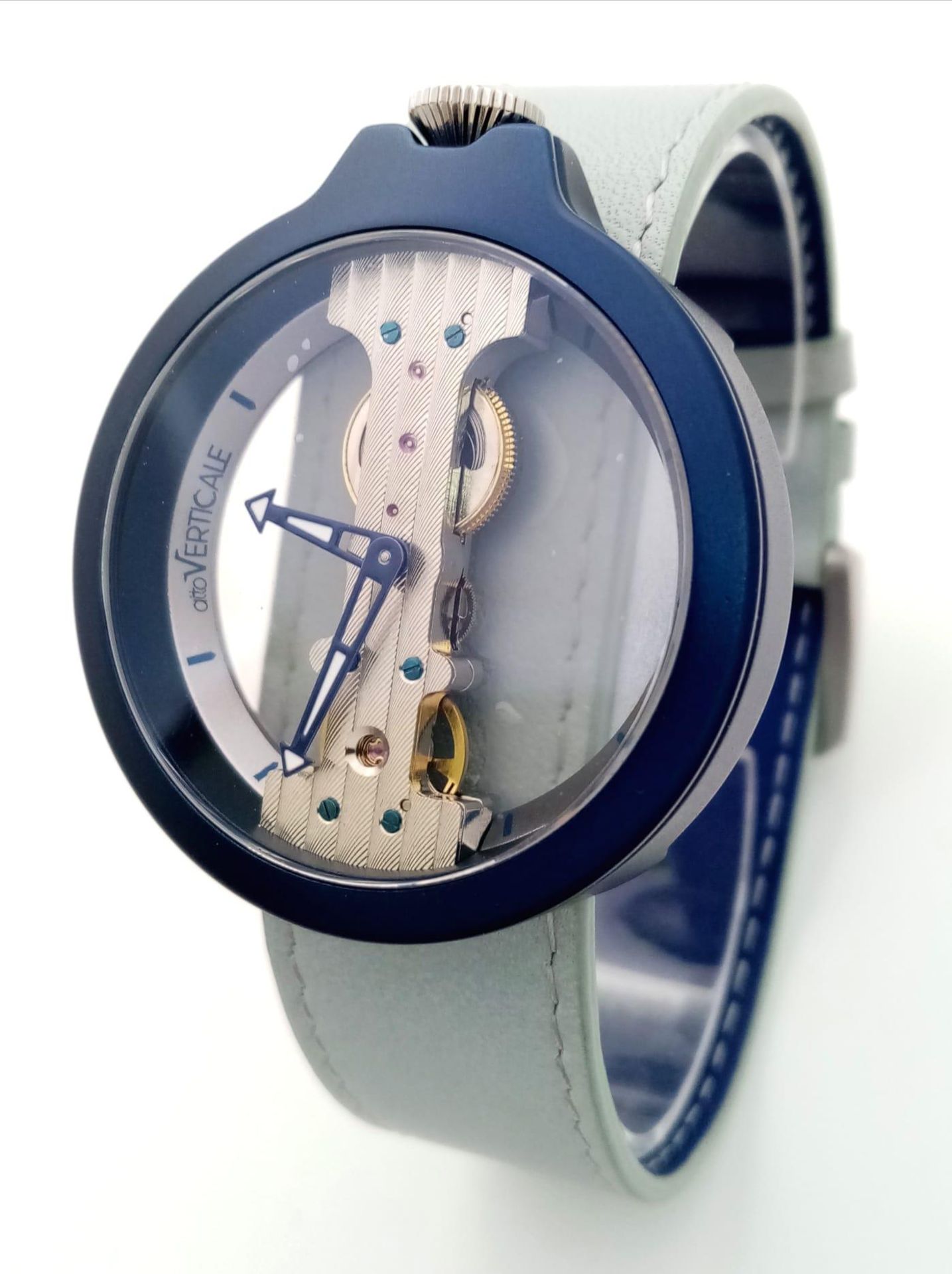 A VERTICALE unisex skeleton watch, dark blue case 42 mm, original grey/blue leather strap (