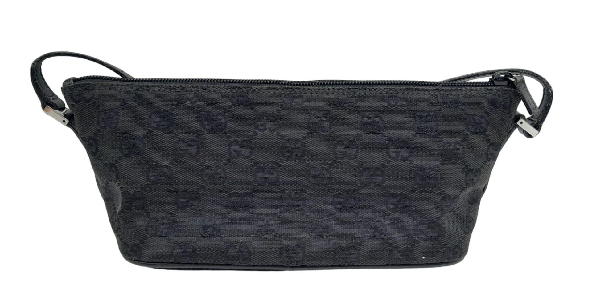 A Gucci Black Monogram Pochette Boat Bag. Textile exterior with black and silver-toned hardware, - Image 3 of 7