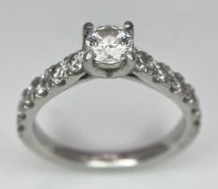 The Best Story - Is The Diamond Story. A 950 platinum diamond ring with a central SI1 0.40ct