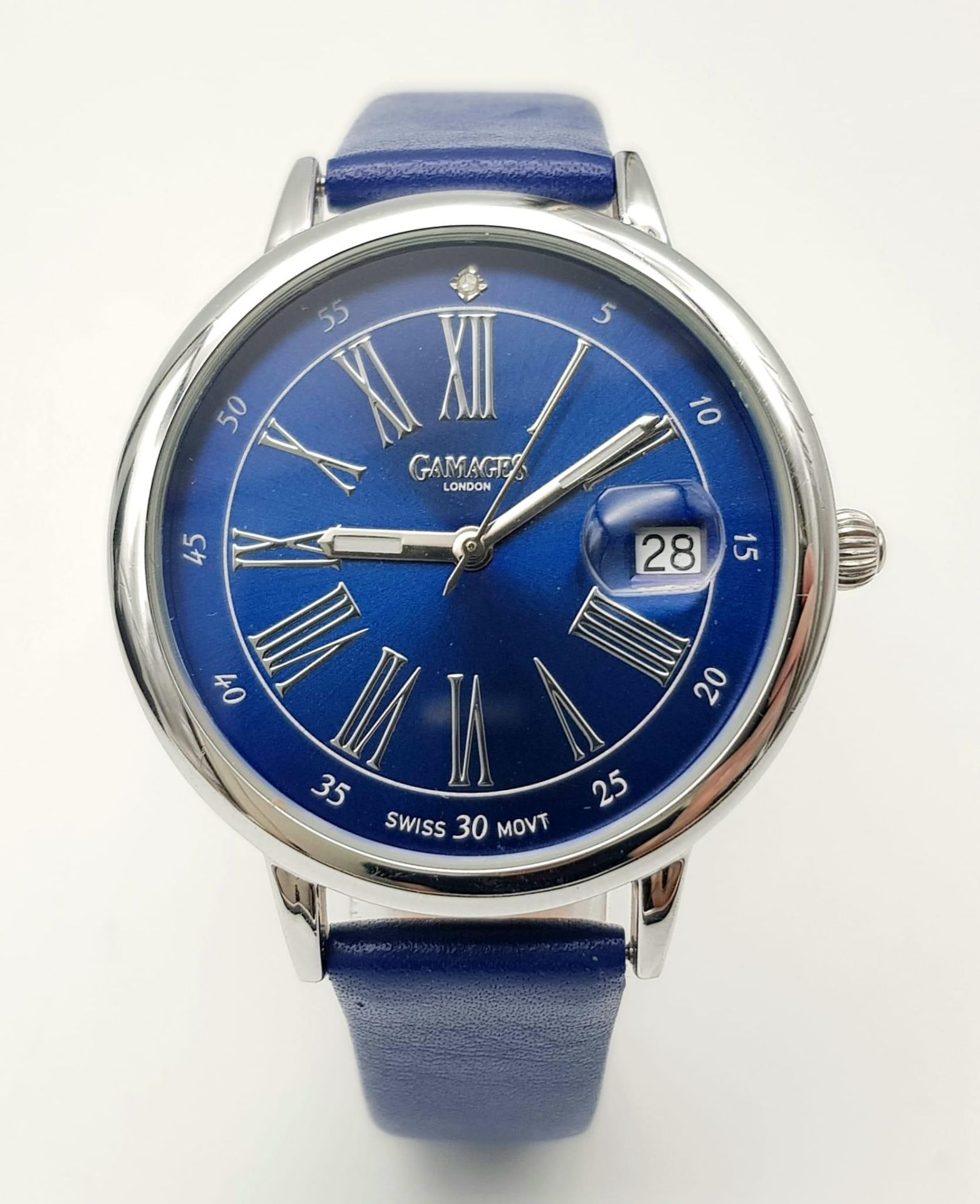 A Gamages of London Quartz Ladies Watch. Blue leather strap. Stainless steel case - 37mm. Ice blue