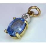 A NATURAL UNTREATED SAPPHIRE AND DIAMOND PENDANT . 1.0gms