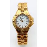A Krug Baumen Gold Plated Quartz Ladies Watch. Stainless steel bracelet and case - 27mm. White dial.
