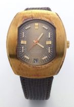 A Vintage Automatic Caravelle Gents Watch. Brown leather strap. Gilded stainless steel case -