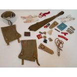 An Assortment of Vintage British Military Belts, Buckles and Badges.