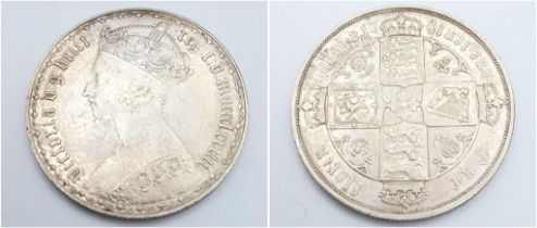 An 1883 Queen Victoria Silver Florin Coin. Please see photos for conditions.