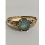 9 carat GOLD, AQUAMARINE SOLITAIRE RING. Complete with ring box. 1.74 grams. Size N - N 1/2.