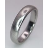 A Tiffany and Co Platinum 4mm rounded band ring. 9.3g. Size Q.