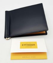 A New in Box, Ettinger Leather Card and Money Wallet. Very High Quality. This Wallet is from the