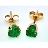 A Pair of 9K Yellow Gold and Emerald Stud Earrings. 0.5g total weight.