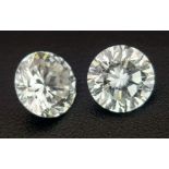 A top quality pair of brilliant cut diamonds, 0.402 carats each, with certificates from