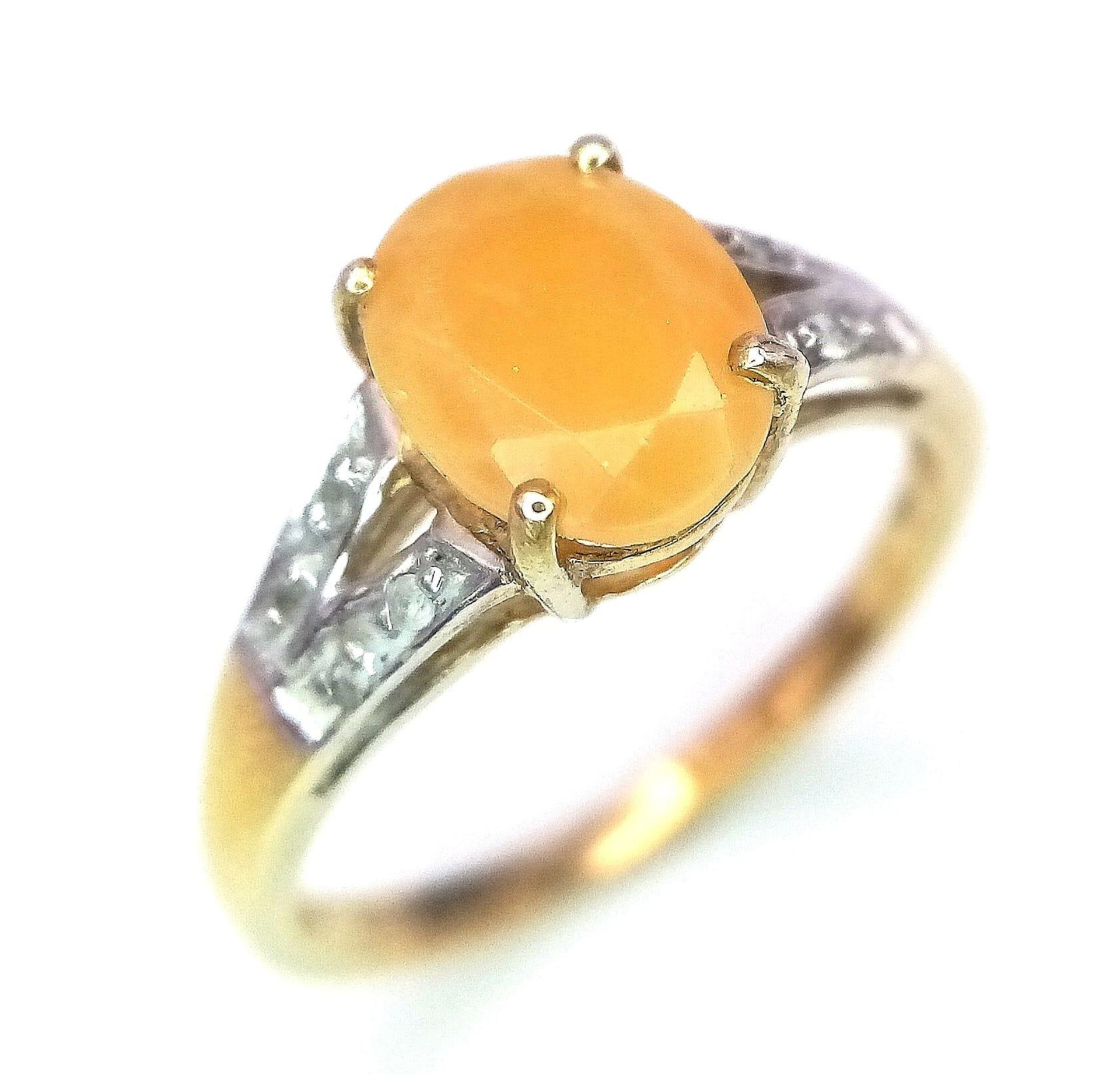 A 9K GOLD AGATE AND DIAMOND RING . 1.8gms size L