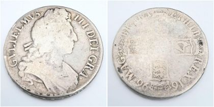 A 1696 William III Silver Crown Coin. Please see photos for conditions.