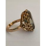 9 carat GOLD RING with Large Oval Cut BROWN AMETHYST Set to top in attractive Regal Mount. Please