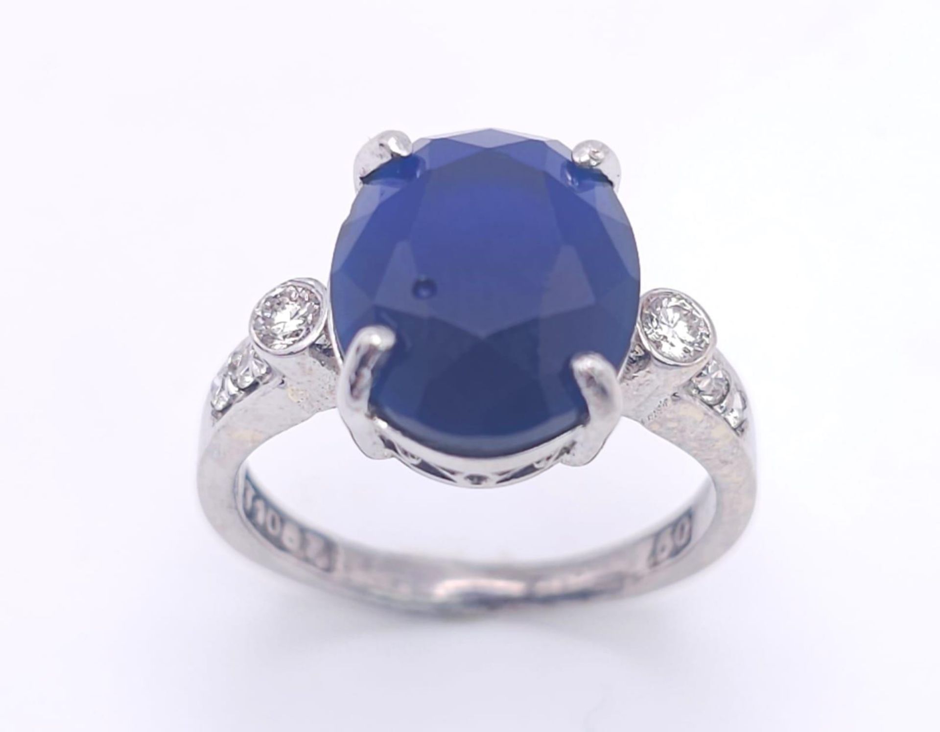 An 18K White Gold Sapphire and Diamond Ring. Central 3ct sapphire with diamond accents. Size M. 4. - Image 2 of 6