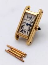 A Vintage 18K Gold Cartier Mini Tank Ladies Watch Case. 18k gold case with 2443 and other Cartier
