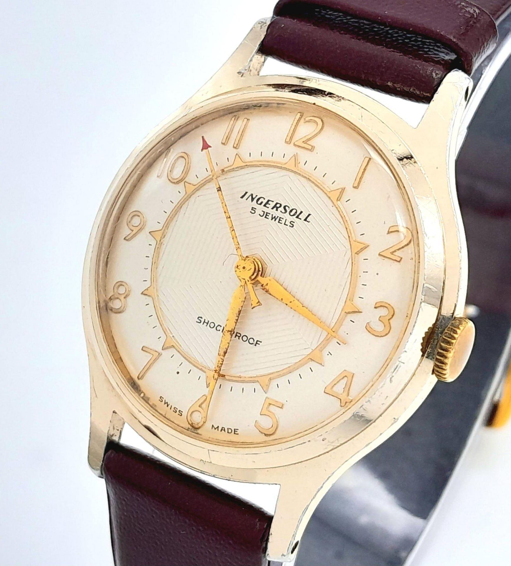 A Vintage Ingersoll Mechanical Gents Watch. Burgundy leather strap. Gilded case - 32mm. Cream - Bild 2 aus 5