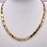 A 14k Yellow Gold Articulated Bar-Link Necklace. Stylish links with screw-esque spacers. 42cm