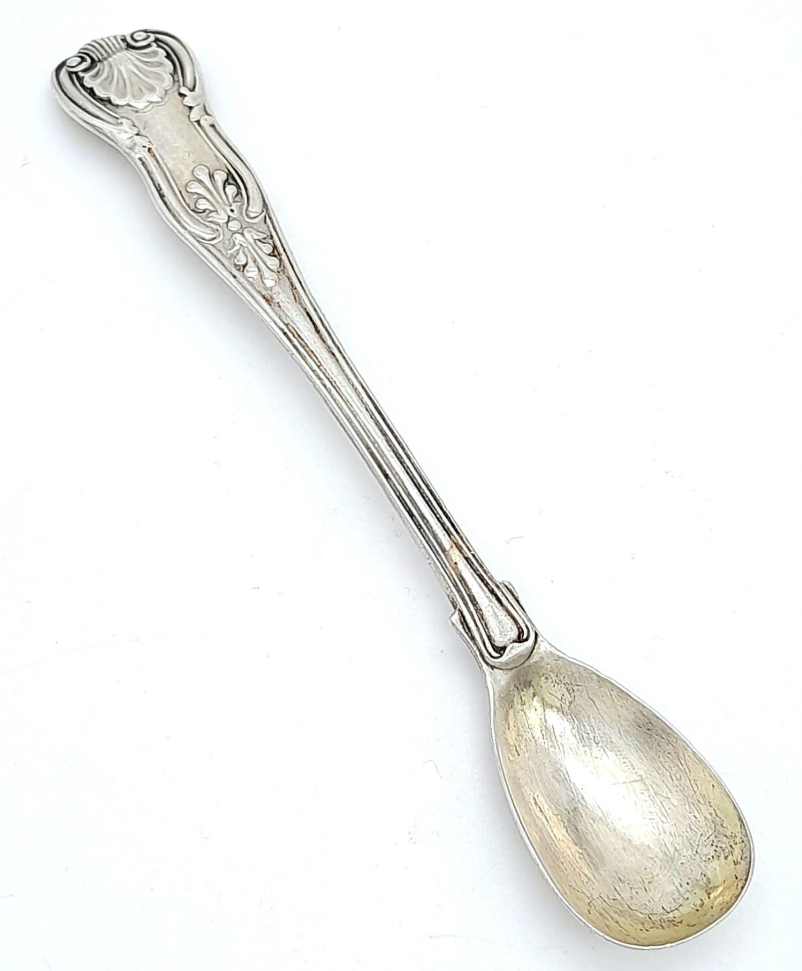 An antique Victorian sterling silver teaspoon with tremendous floral engravings on handle. Come with