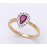 A 18K YELLOW GOLD DIAMOND & PEAR SHAPED RUBY RING, WEIGHT 2.9G SIZE N