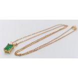 An 18K Yellow Gold Emerald Pendant on an 18K Yellow Gold Disappearing Necklace. 10mm - pendant. 42cm