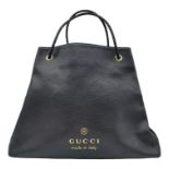 A large black Gucci calfskin Gifford bag with braided handles. Open top with black fabric