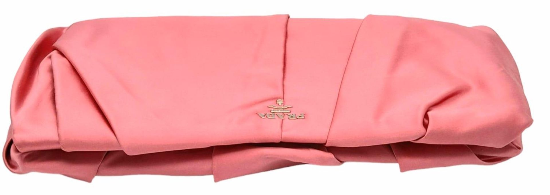 A Prada Pink Pleated Clutch Bag. Satin exterior with silver-toned hardware and press lock closure to - Image 3 of 9