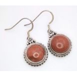 A Pair of Sunstone Earrings Set in 925 Sterling silver. 14ct. W-7g. Comes with a presentation