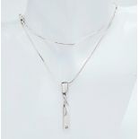 A stylist 925 silver CZ pendant on sparkling Italy silver chain. Total weight 8.85G. Total length