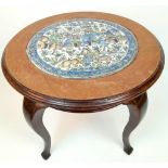 AN ANTIQUE SMALL QAJAR TABLE WITH CERAMIC TOP DEPICTING THE PERSIAN VICTORIES IN BATTLE . 51cms TALL