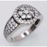 A Sterling Silver Decorative White Zircon Ring. Size K.