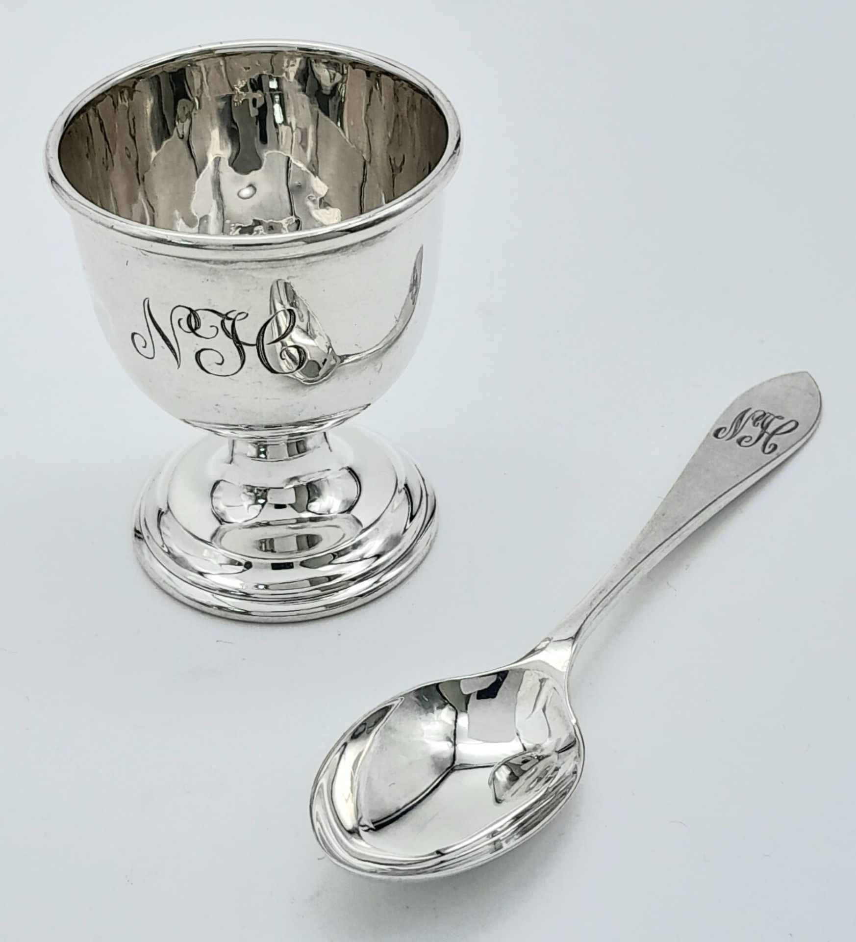 A Vintage Sterling Silver Egg Cup and Spoon. Birmingham hallmarks. 46g total weight.