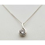 A fancy 925 silver Zirconia pendant on sparkling silver chain. Total weight 3G. Total length 41cm.