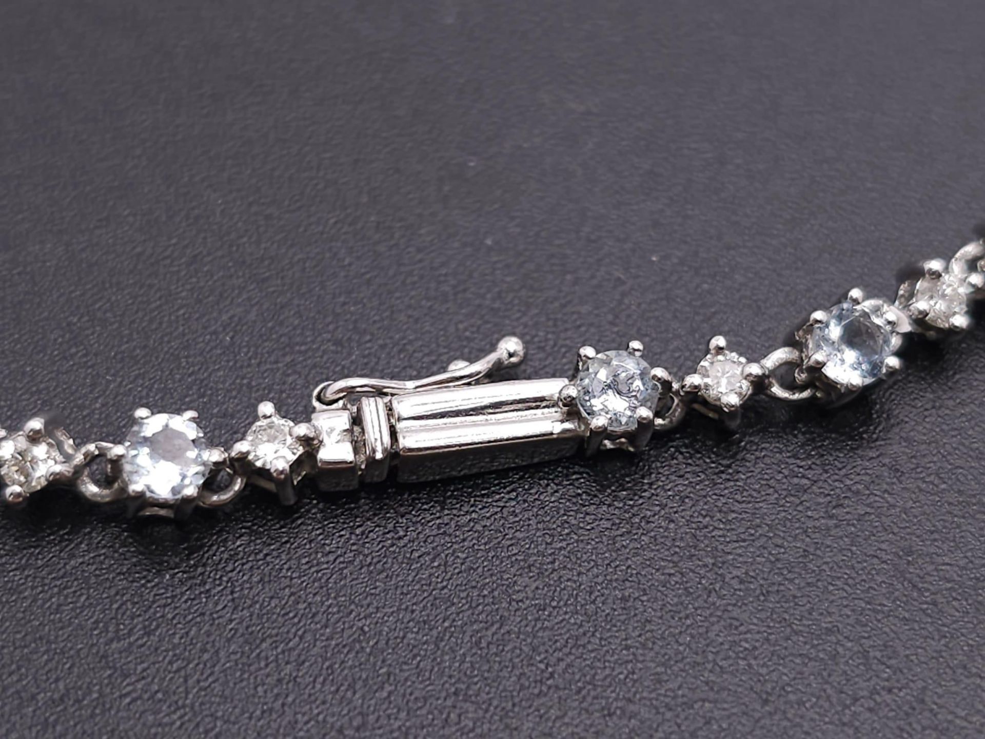 A STUNNING 14K WHITE GOLD DOUBLE ROW DROP STATEMENT NECKLACE, SET WITH 1.50CT HALO DIAMOND & - Image 8 of 10
