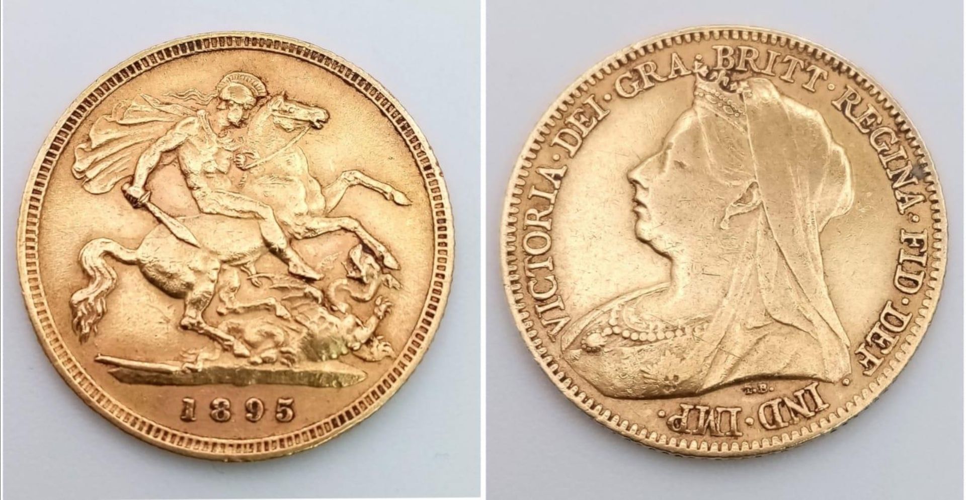 A 22K GOLD HALF SOVEREIGN DATED 1895 WITH VEIL HEAD QUEEN VICTORIA .