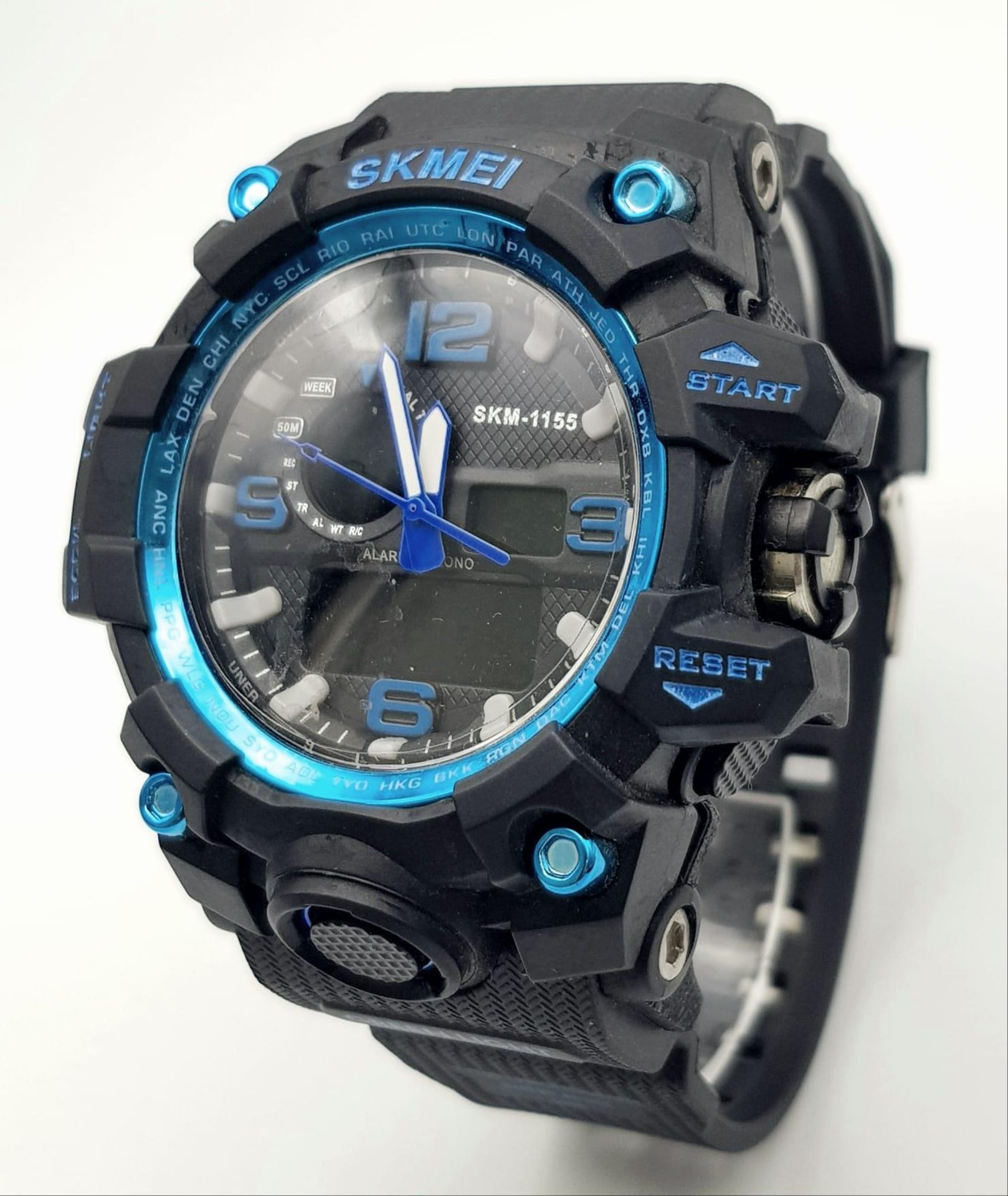 A Digital and Analogue Sports Watch by Skmei. Comes with Boxed and with Tags. Full Working Order.