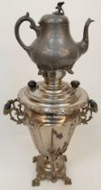 A RUSSIAN "SAMOVAR" KETTLE ON STAND .