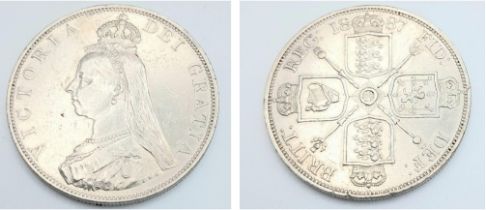 An 1887 Queen Victoria Silver Double Florin Coin. VF+ Grade but please see photos for conditions.