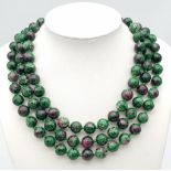 A Natural Ruby and Emerald Bead Rope Necklace. 8/10mm beads. 120cm in length.