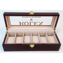 A Six Space Watch Case - Perfect for Rolex Watches. Polished veneer exterior. Plush interior. In