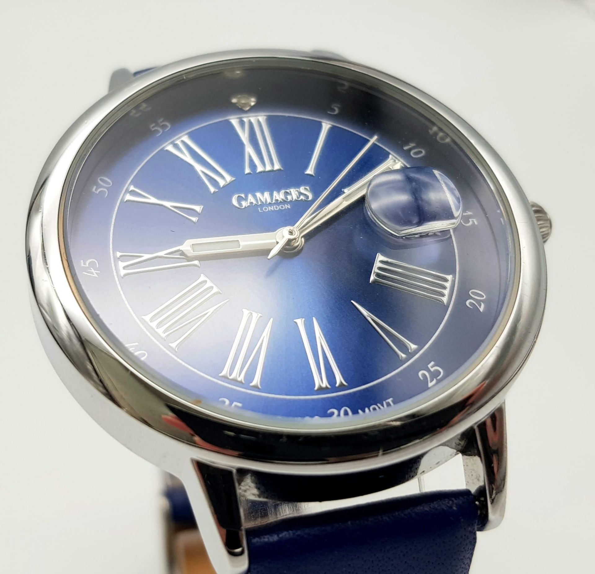 A Gamages of London Quartz Ladies Watch. Blue leather strap. Stainless steel case - 37mm. Ice blue - Image 3 of 6
