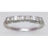 A PLATINUM DIAMOND BAND RING, WEIGHT 3.7G SIZE T