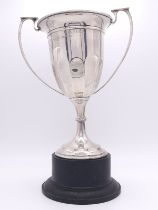 A Sterling Silver Two Handled Trophy Cup - Given to the yearly winner of The Christy Cup Challenge