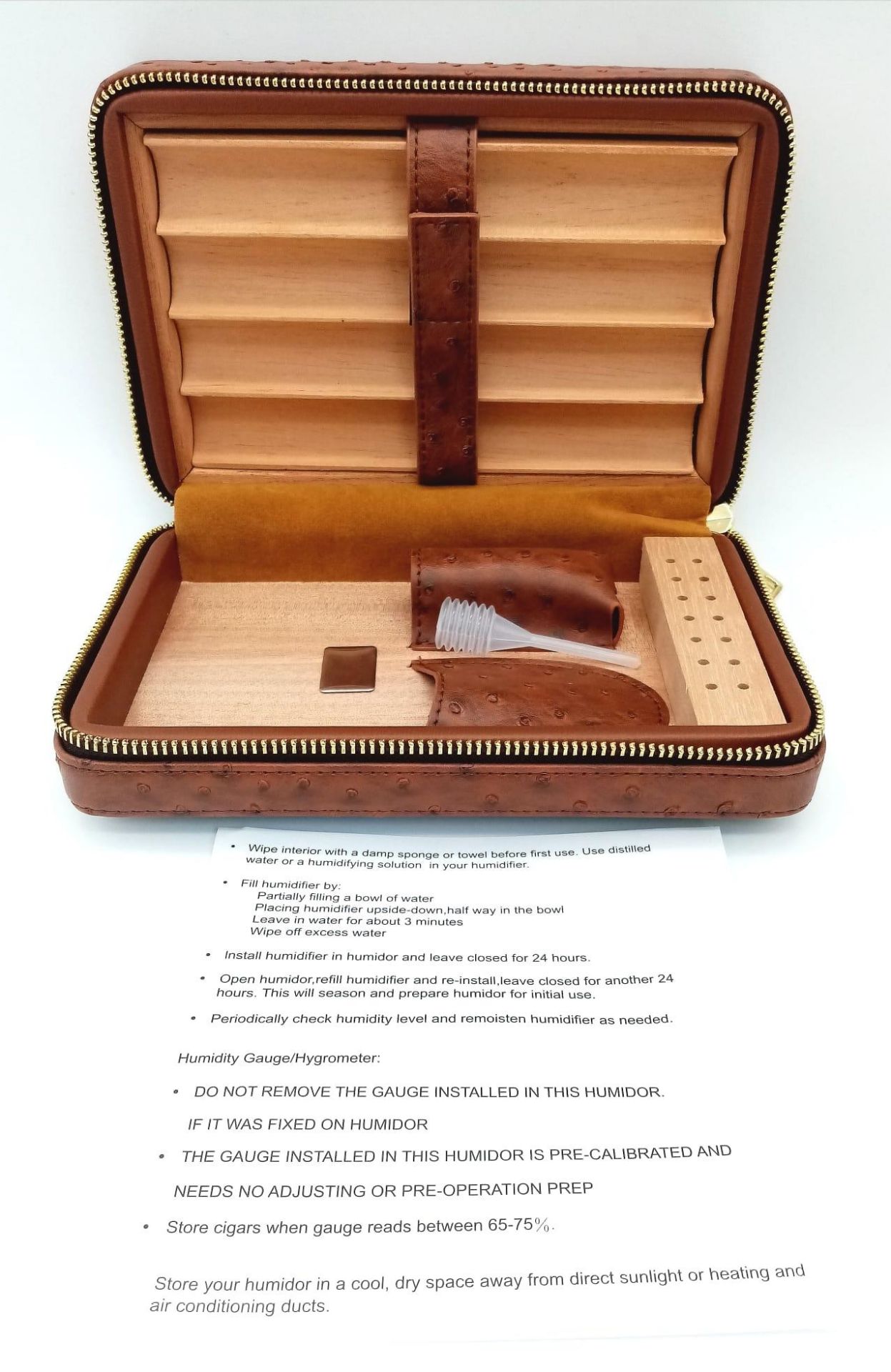 A COHIBA traveling cigar humidor oozing quality and class. Exterior ostrich leather covering the