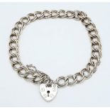 A 925 silver curb link bracelet with safety chain and heart padlock. Total weight 12.7G. Total