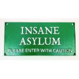 No large family should be without one! A cast iron sign “INSANE ASYLUM, PLEASE ENTER WITH CARE”.