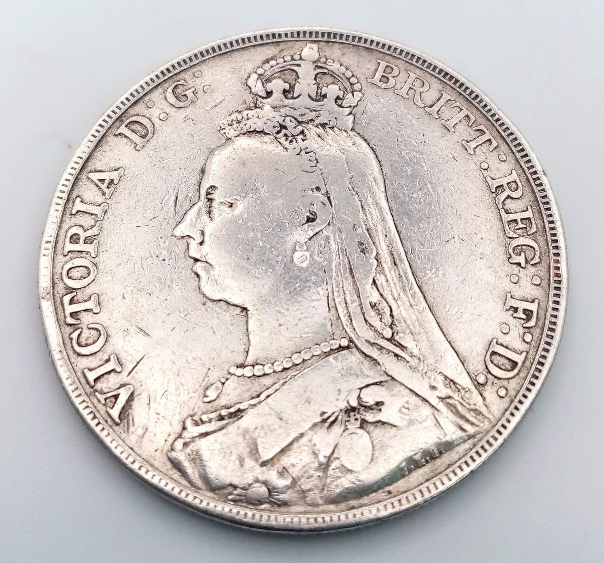 An 1889 Queen Victoria Silver Crown. VF grade but please see photos. - Image 2 of 3