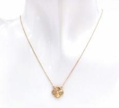 An 18K Yellow Gold Lucky Clover Pendant on an 18K Yellow Gold Disappearing Necklace. 10mm - pendant.