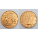 A 22K GOLD SOVEREIGN DATED 1958 IN VERY GOOD CONDITION .