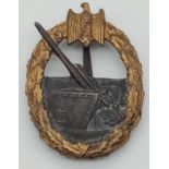 WW2 German Kriegsmarine Coastal Artillery Badge. Maked with the number 65 for Klein & Quenzer.